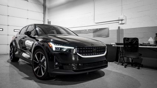 A black car in a garage | Paint correction Livonia
