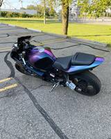 A motorcycle wrapped with a holographic purple vinyl wrap | Motorcycle wraps Livonia