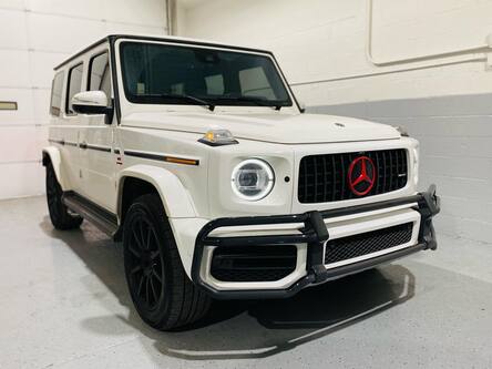 A white car with window tinting in Canton